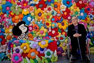 En septiembre de 2014, junto a Mafalda y rodeado de flores