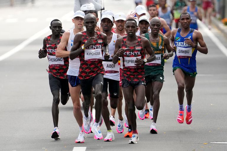 Eliud Kipchoge, of Kenya, leads during the men's marathon at the 2020 Summer Olympics, Sunday, Aug. 8, 2021, in Sapporo, Japan. (AP Photo/Shuji Kajiyama)
