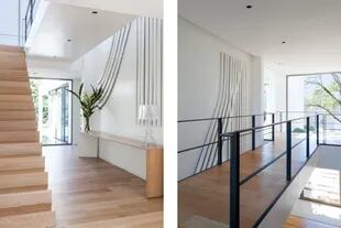 En el hall de acceso, obra ‘Fusión’ de Ana Dardik. Consola (Estudio XFB Arquitectura y Decoración). Lámpara (Philippe Starck)