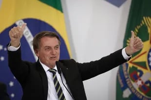 El presidente brasileño, Jair Bolsonaro, asiste a la ceremonia de firma del decreto del Bono de Producto Rural Verde