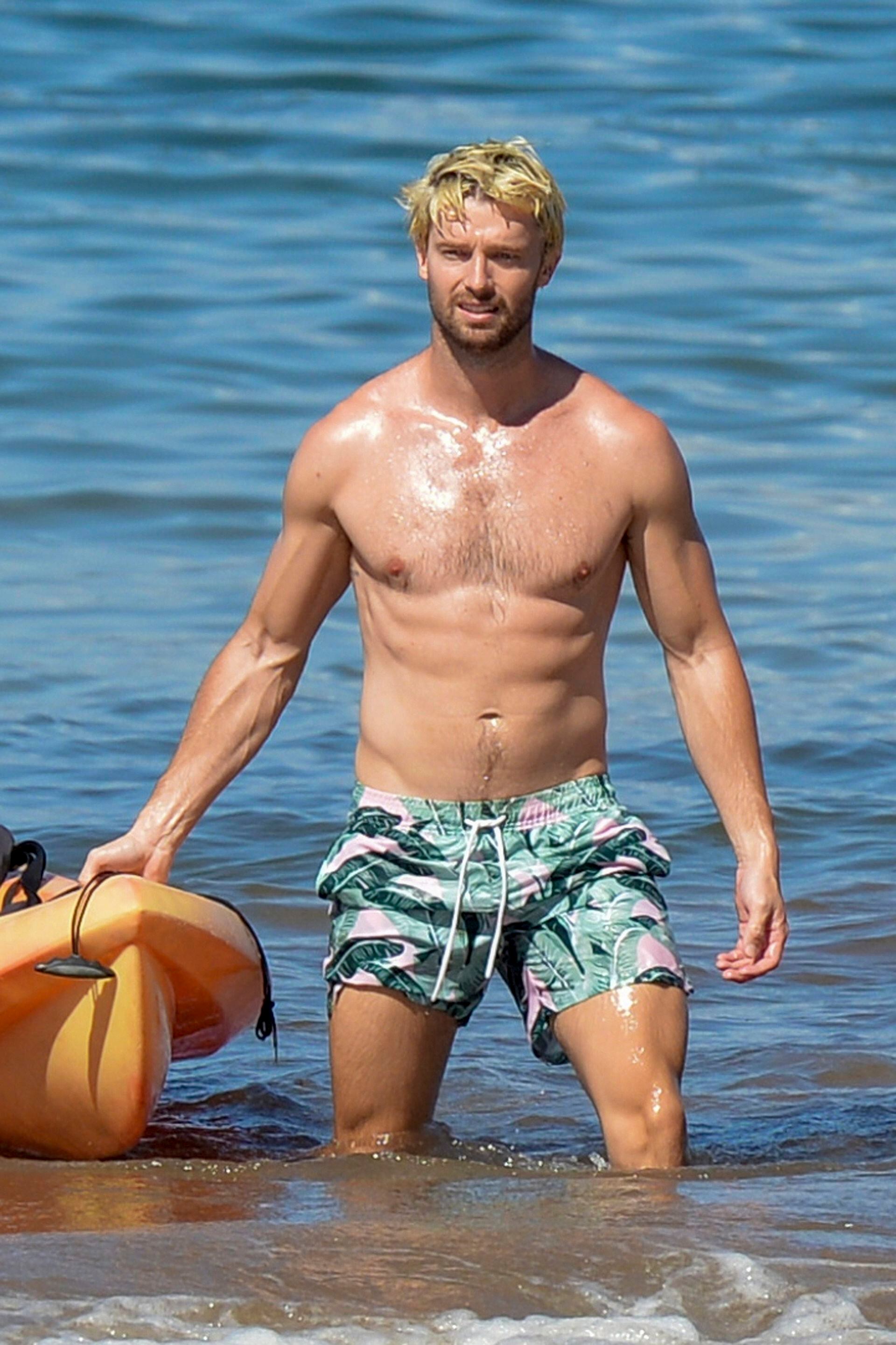 Patrick Schwarzenegger showed off his new blonde locks and muscles on the beaches of Maui  
