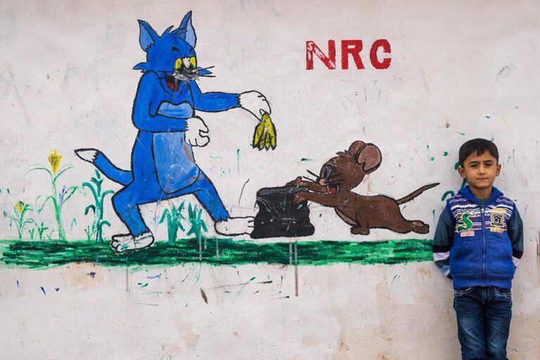 Una pintura de Tom y Jerry en el campo de refugiados Domiz de Irak en 2014