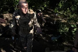 Michael, a soldier who serves as his battalion's supply liaison, frequently exchanges captured Russian weapons and vehicles with other Ukrainian units in the Donetsk region of Ukraine on August 24, 2022.