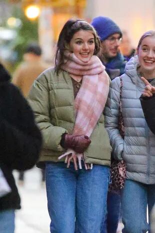 Suri Cruise, daughter of Katie Holmes and Tom Cruise, in high spirits as she spent the afternoon with friends in New York City
