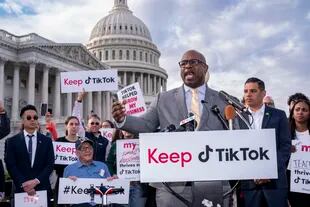 Rep. Jamaal Bowman, D-N.Y., joined at right by Rep. Robert Garcia, D-Calif., leads a rally to defend TikTok and the app's supporters, at the Capitol in Washington, Wednesday, March 22, 2023. The House holds a hearing Thursday, with TikTok CEO Shou Zi Chew about the platform's consumer privacy and data security practices and impact on kids. (AP Photo/J. Scott Applewhite)