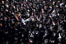 “Es desgarrador”: Israel entierra a los 45 muertos por la estampida