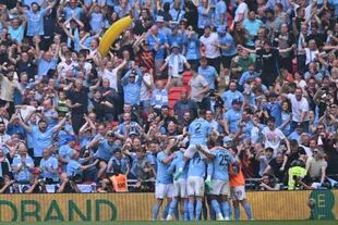 
Manchester City festejando el segundo gol del equipo (Photo by Glyn KIRK / AFP) / NOT FOR MARKETING OR ADVERTISING USE / RESTRICTED TO EDITORIAL USE