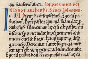 Una lectura de la Pasión de San Alphege agregada al salterio con letra puntiaguda, que De Hamel dice que era típica de Canterbury a principios y mediados del siglo XII; observa el Æ en rojo en la parte superior izquierda
