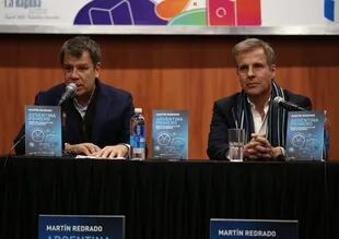 Facundo Manes y Martín Redrado, en la Feria del Libro de Buenos Aires