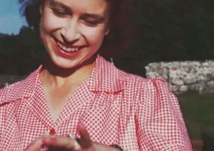 An Image Taken From The Video 'Elizabeth: The Unseen Queen' Of Then-Princess Elizabeth Showing Her New Engagement Ring Shortly After Prince Philip'S Marriage Proposal At Balmoral In 1946