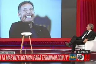 Oscar Ruggeri admirando la dentadura de Miguel Ángel Russo