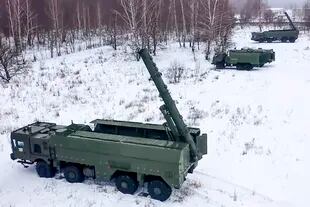FILE - In this photo taken from video provided by the Russian Defense Ministry Press Service on Tuesday, Jan. 25, 2022, The Russian army's Iskander missile launchers take positions during drills in Russia. The Russian invasion of Ukraine is the largest conflict that Europe has seen since World War II, with Russia conducting a multi-pronged offensive across the country. The Russian military has pummeled wide areas in Ukraine with air strikes and has conducted massive rocket and artillery bombardment resulting in massive casualties. (Russian Defense Ministry Press Service via AP, File)