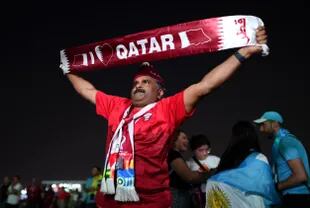 Un fan de Qatar antes del Fan Festival en Doha.