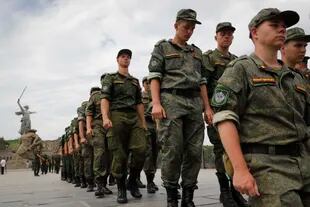 Russian military soldiers march in support of soldiers participating in a special military operation in Ukraine at Mamev Kurgan, a World War II memorial, in Volgograd, Russia, Monday, July 11, 2022.