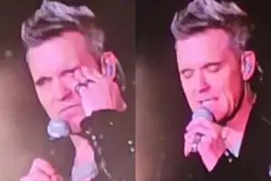 El mal momento de Robbie Williams: el cantante lloró en el escenario al hablar de sus adicciones y depresión