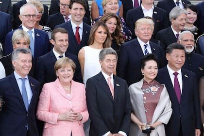Entre los presidentes del mundo, Merkel y su marido