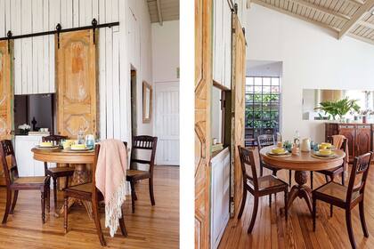 Sobre la mesa, platos grises, bowls con rayas amarillos, vasos azules, tazas, botella para agua y jarra (todo de Salmón Tienda). El juego de comedor es una composición de partes.