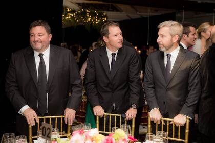 Alejandro MacFarlane, Jorge Brito hijo y Rogelio Frigerio