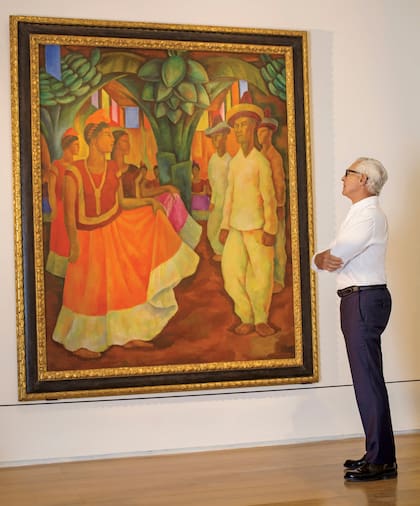 Eduardo Costantini frente a Baile de Tehuantepec, de Diego Rivera, que compró en 2016 por 15,7 millones de dólares.