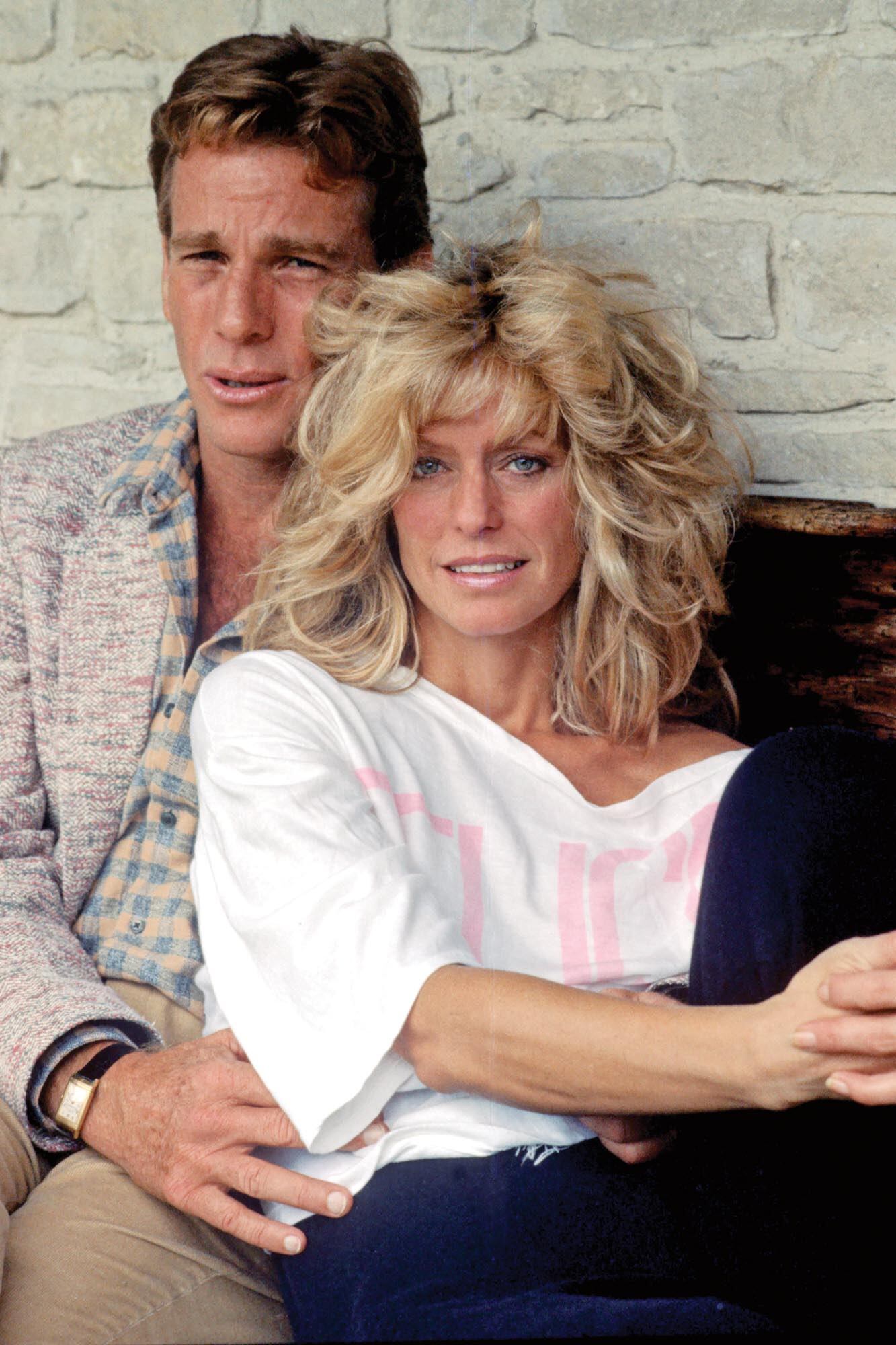 Ryan O'Neal y Farrah Fawcett en Deauville, Francia, en 1984