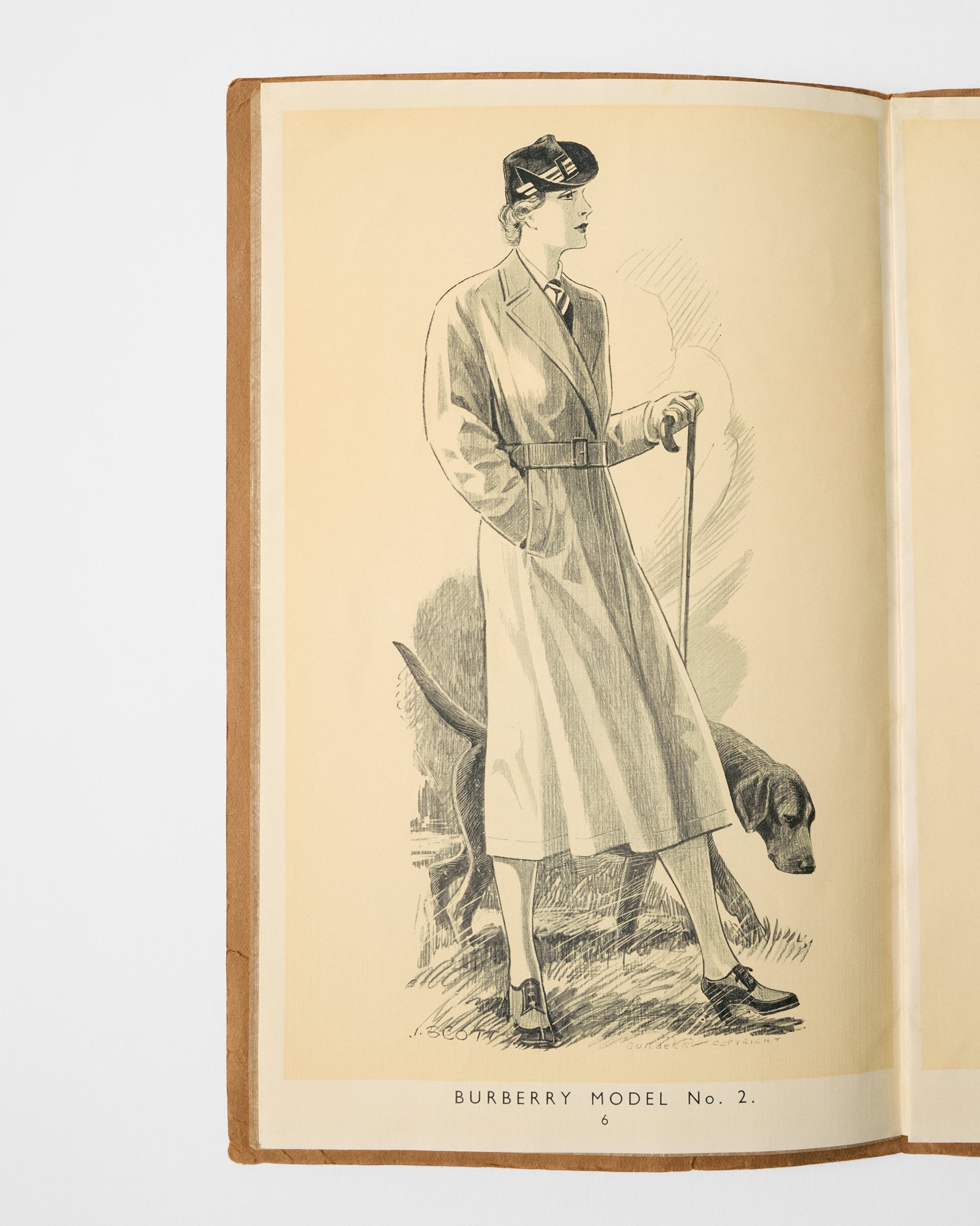 Un catálogo de moda femenina con trench coat (1937)