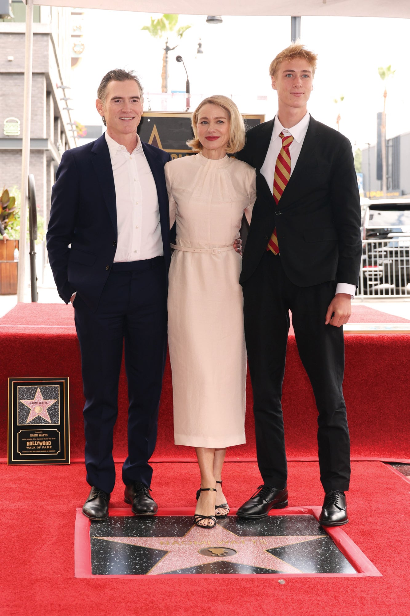 Junto a su
marido, el actor Billy Crudup, y
su hijo, Sasha Schreiber, de su
anterior matrimonio con
Liev Schreiber