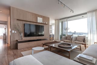 Distribución, iluminación y texturas, ejes en la reforma de este depto de 125m2