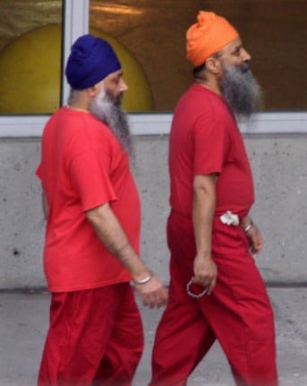 Malik y Bagri mientras estuvieron bajo custodia en 2004 (Foto: Getty Images)