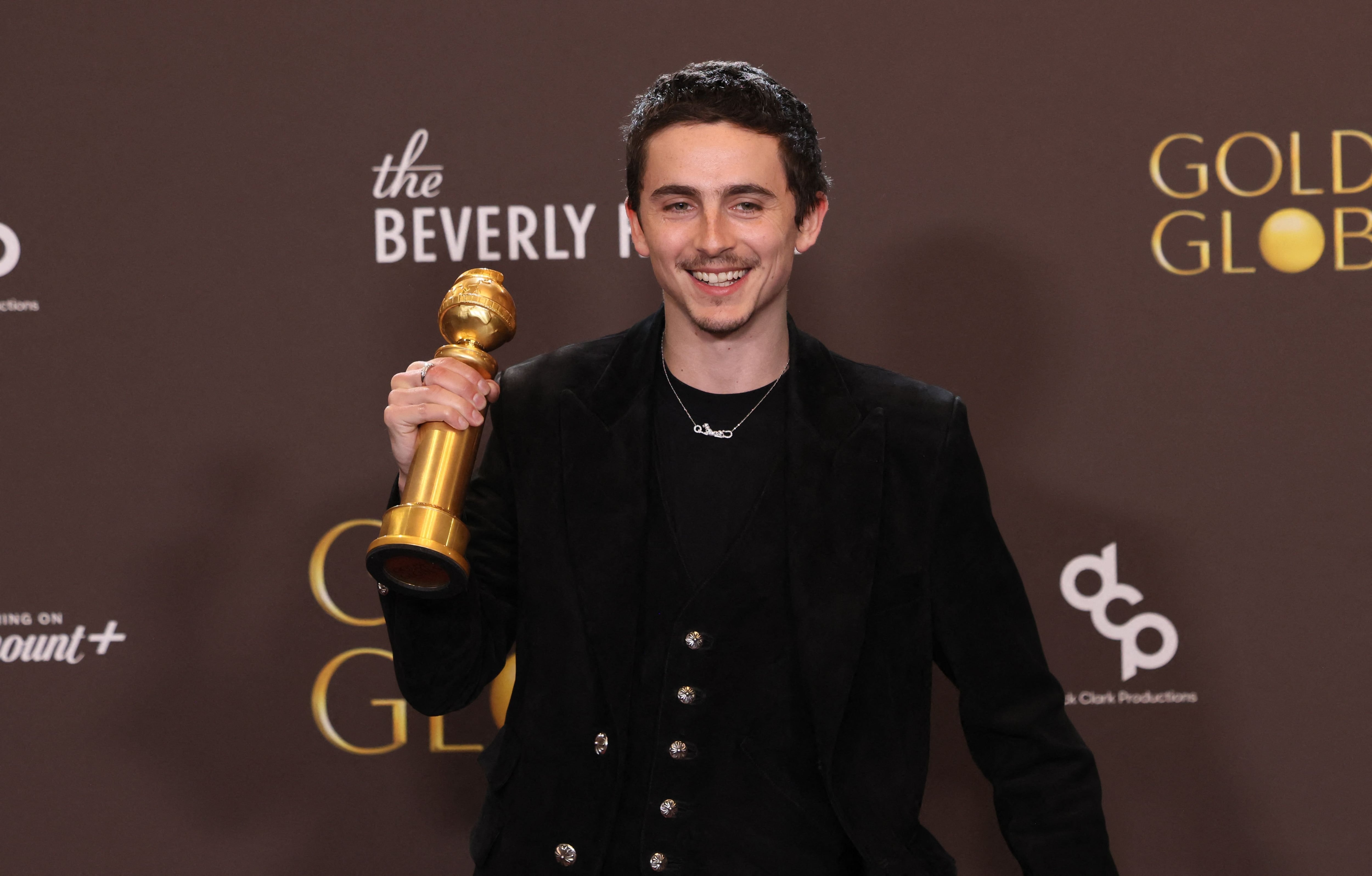 Timothée Chalamet tras ganar el Golden Globe por su actuación en Marty Supreme (Photo by Etienne Laurent / AFP)
