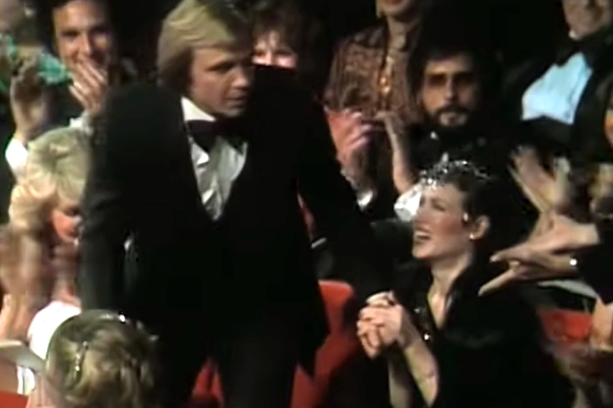 Jon Vopght junto a Stacey Pickren en la entrega de los premios Oscar de 1979