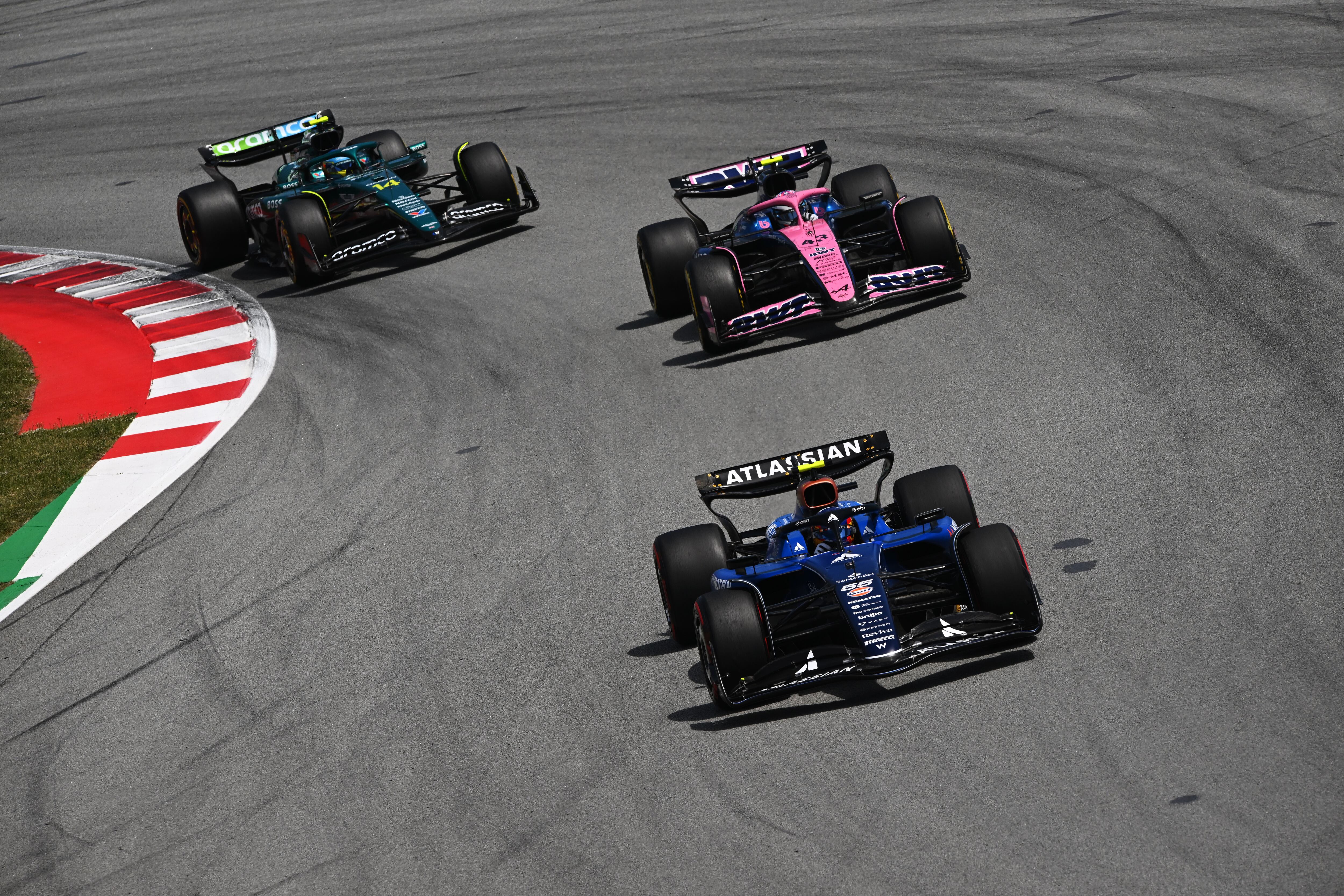 BARCELONA, SPAIN - JUNE 01: Carlos Sainz of Spain driving the (55) Williams FW47 Mercedes leads Franco Colapinto of Argentina driving the (43) Alpine F1 A525 Renault and Fernando Alonso of Spain driving the (14) Aston Martin F1 Team AMR25 Mercedes on track during the F1 Grand Prix of Spain at Circuit de Barcelona-Catalunya on June 01, 2025 in Barcelona, Spain. (Photo by Rudy Carezzevoli/Getty Images)