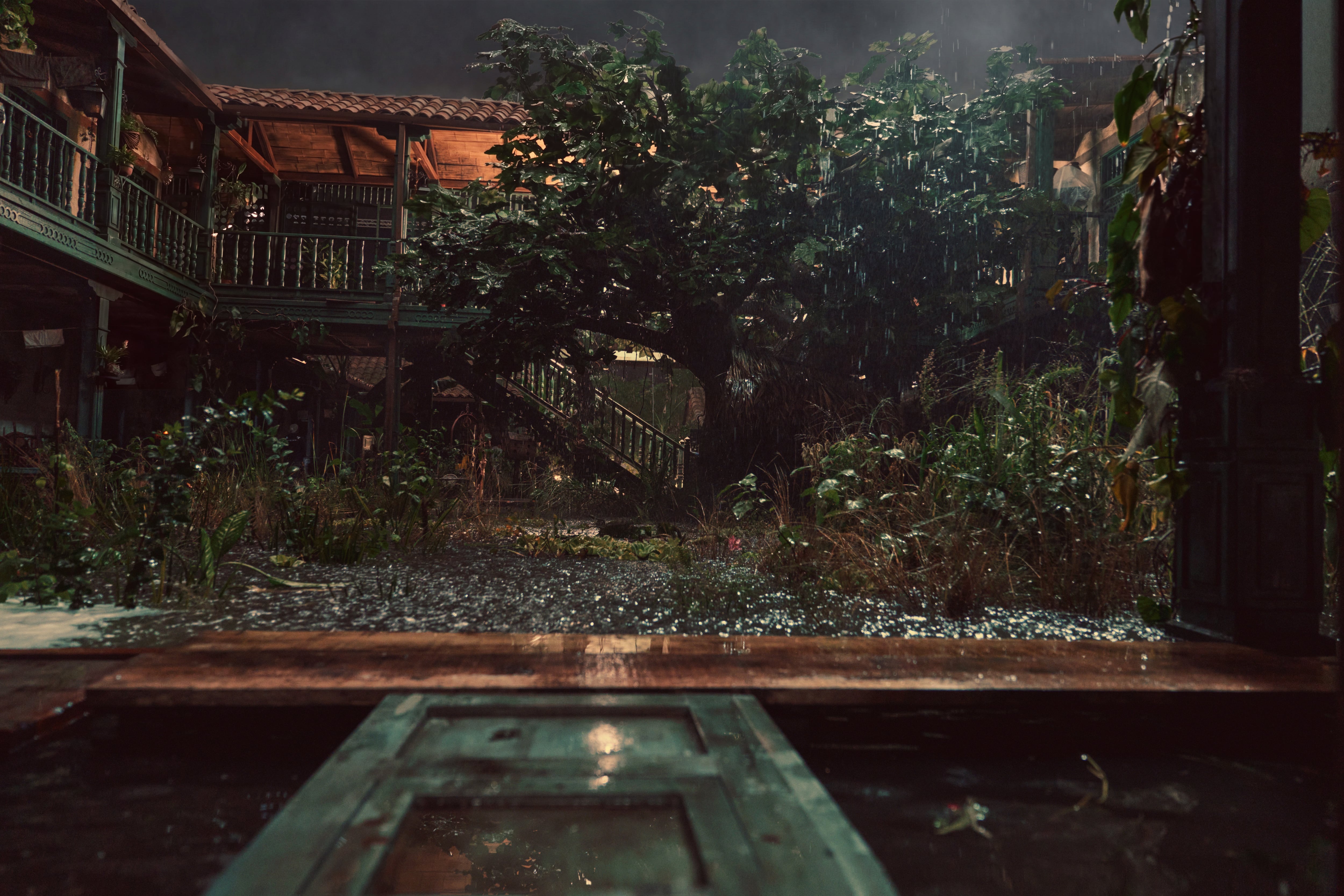 El jardín de la casa Buendía y su icónico castaño durante el diluvio de cuatro años, once meses y dos días que azotó a Macondo