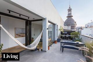 La vista a la cúpula del edificio guió la original reforma de este último piso