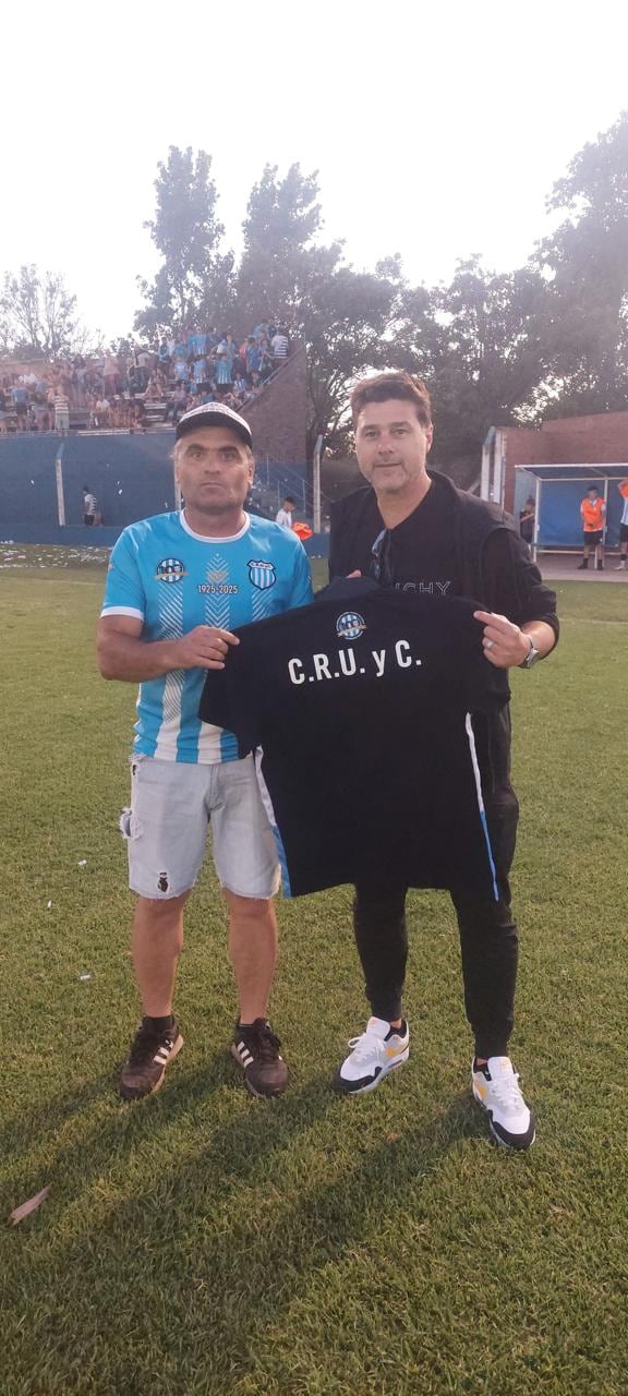 El DT con el expresidente Diego Baracco