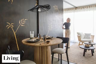 Con un mural impactante sobre una puerta corrediza, este monoambiente pasó de ser estándar a ultra personal