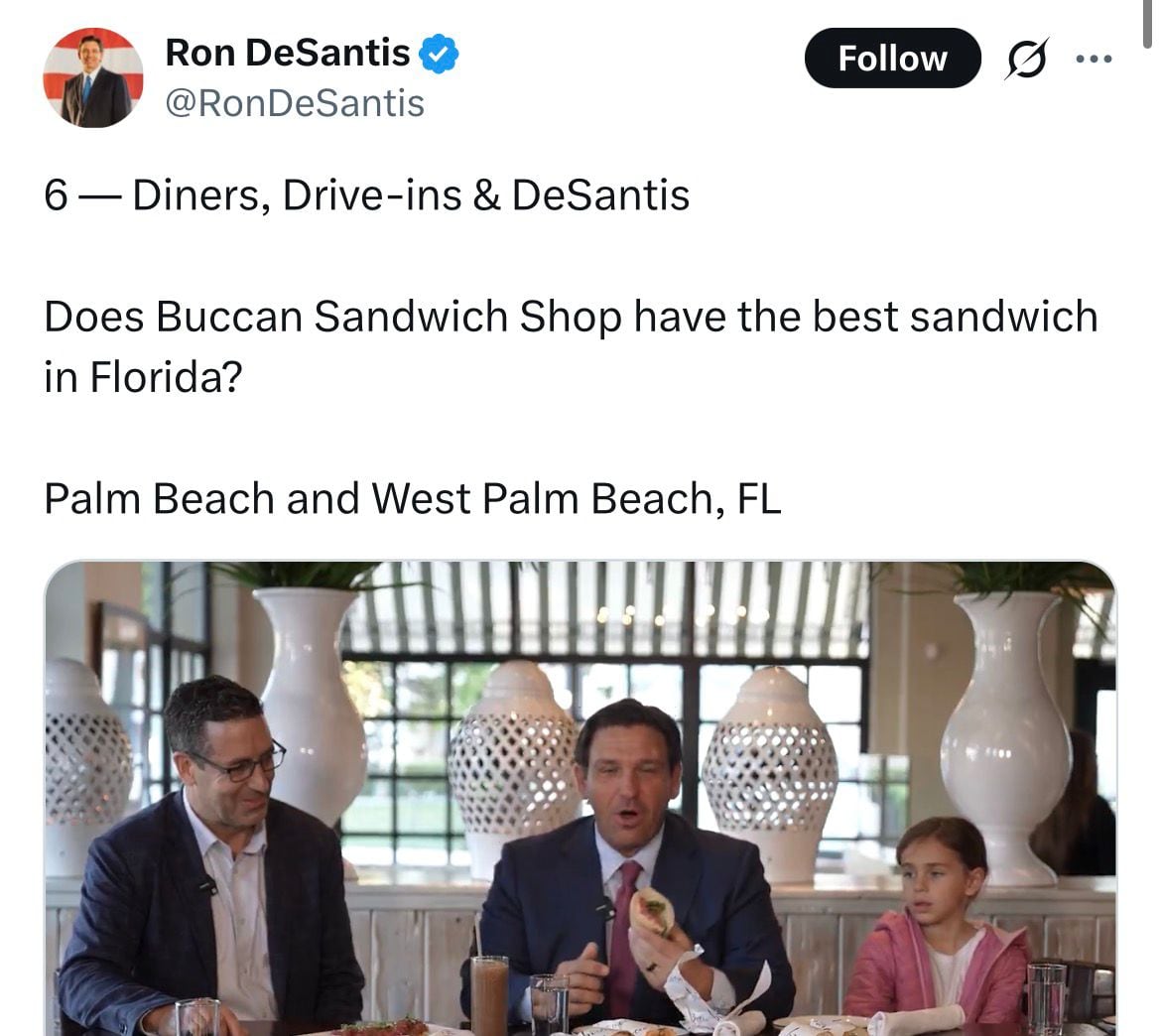 El gobernador Ron DeSantis posa junto al personal de Buccan Sandwich Shop durante la grabación de un nuevo episodio de su serie sobre gastronomía local en Palm Beach