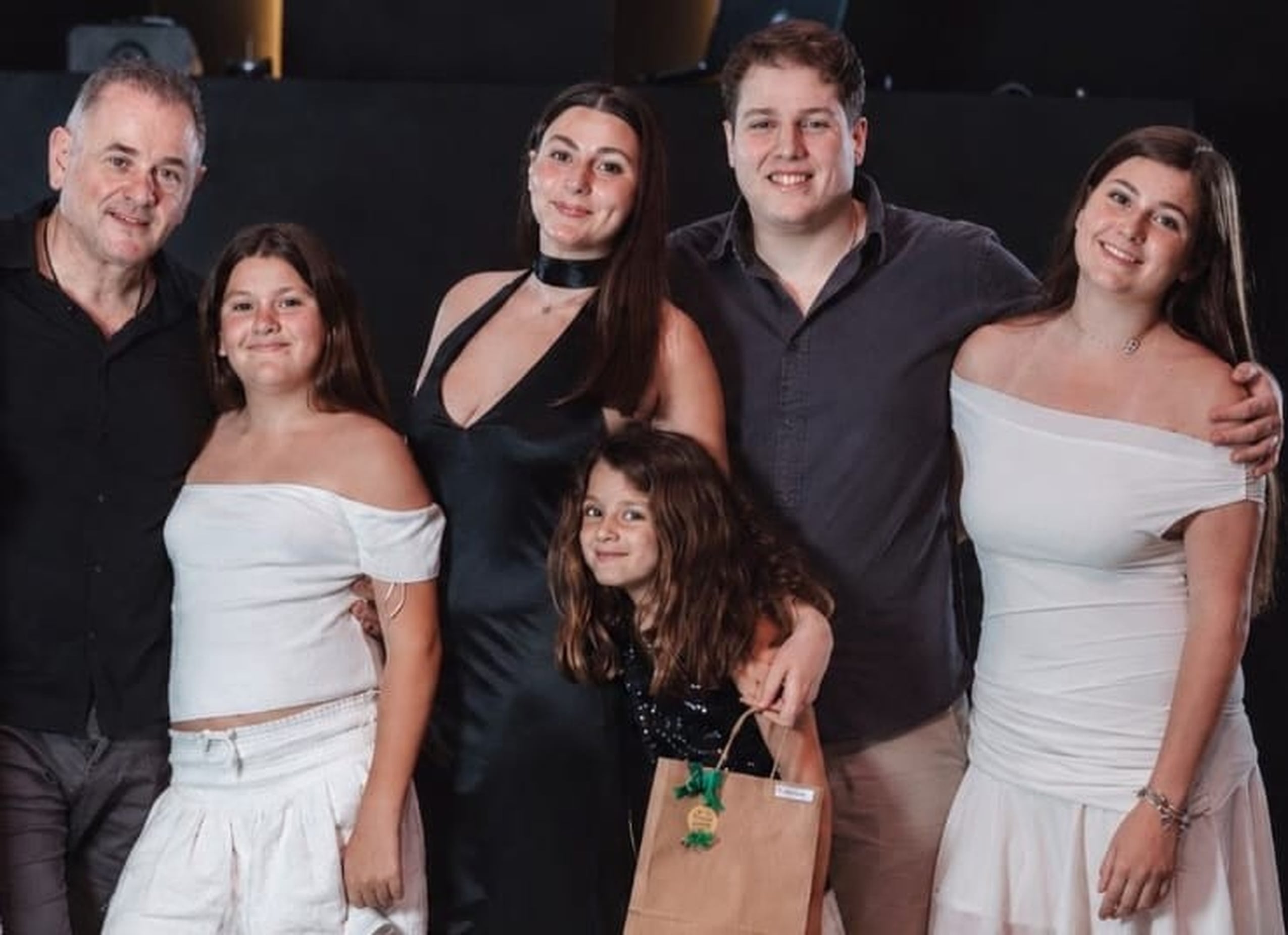 Franco Malacisa con sus hijos