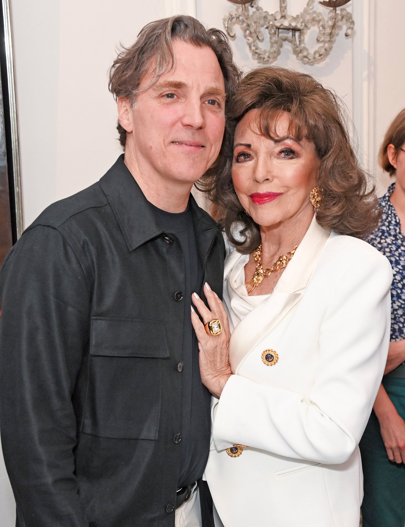 Collins junto a Sacha, que es artista, retratista, escritor y profesor