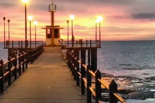 El encanto de las misteriosas noches de los pescadores del Muelle de Martínez