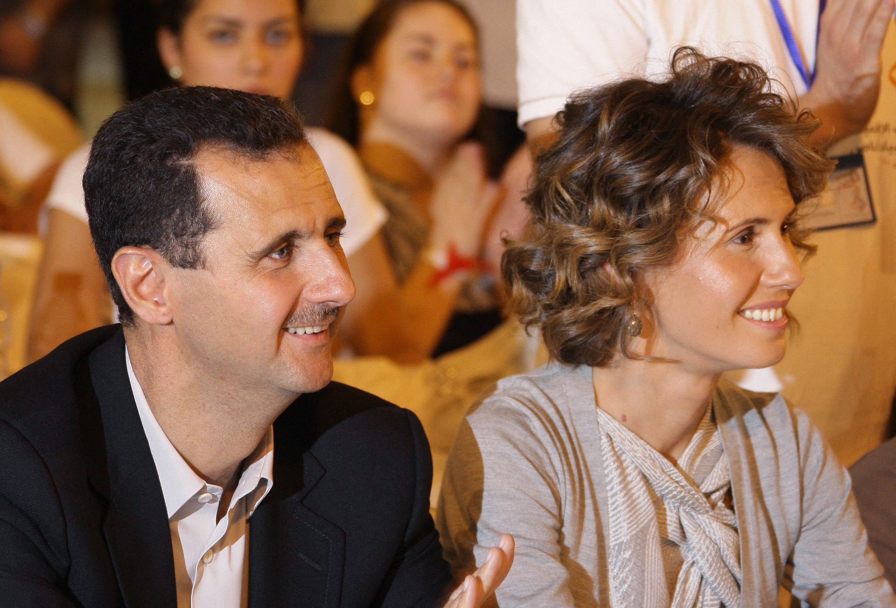 Bashar al-Assad y su mujer, Asma, en Damasco, en 2010. (Louai BESHARA / AFP)