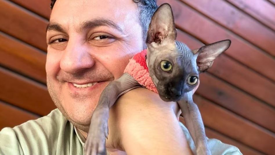 Diego Topa y su gato Jesús