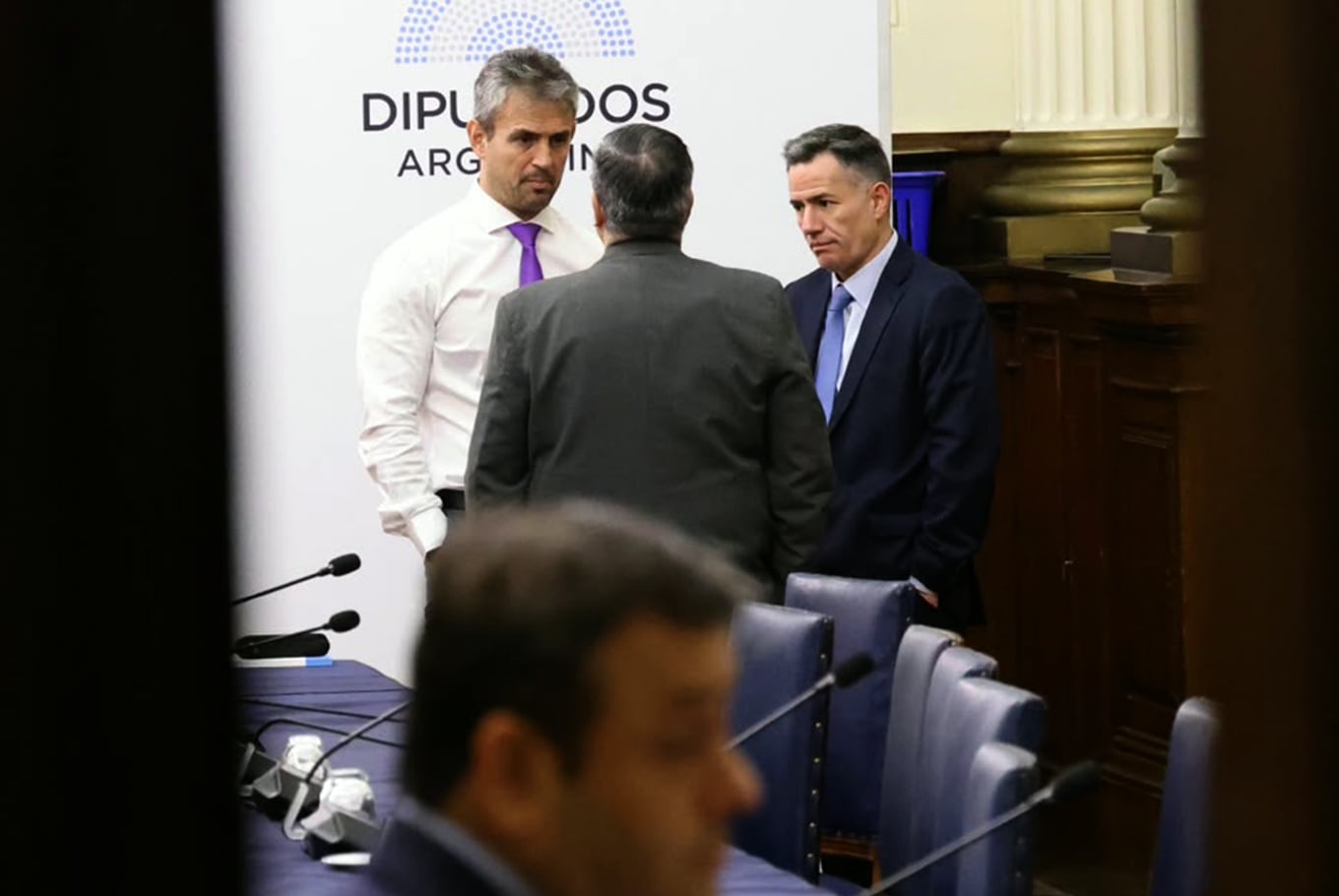 Martín Menem, Germán Martínez y Bornoroni, antes de la sesión