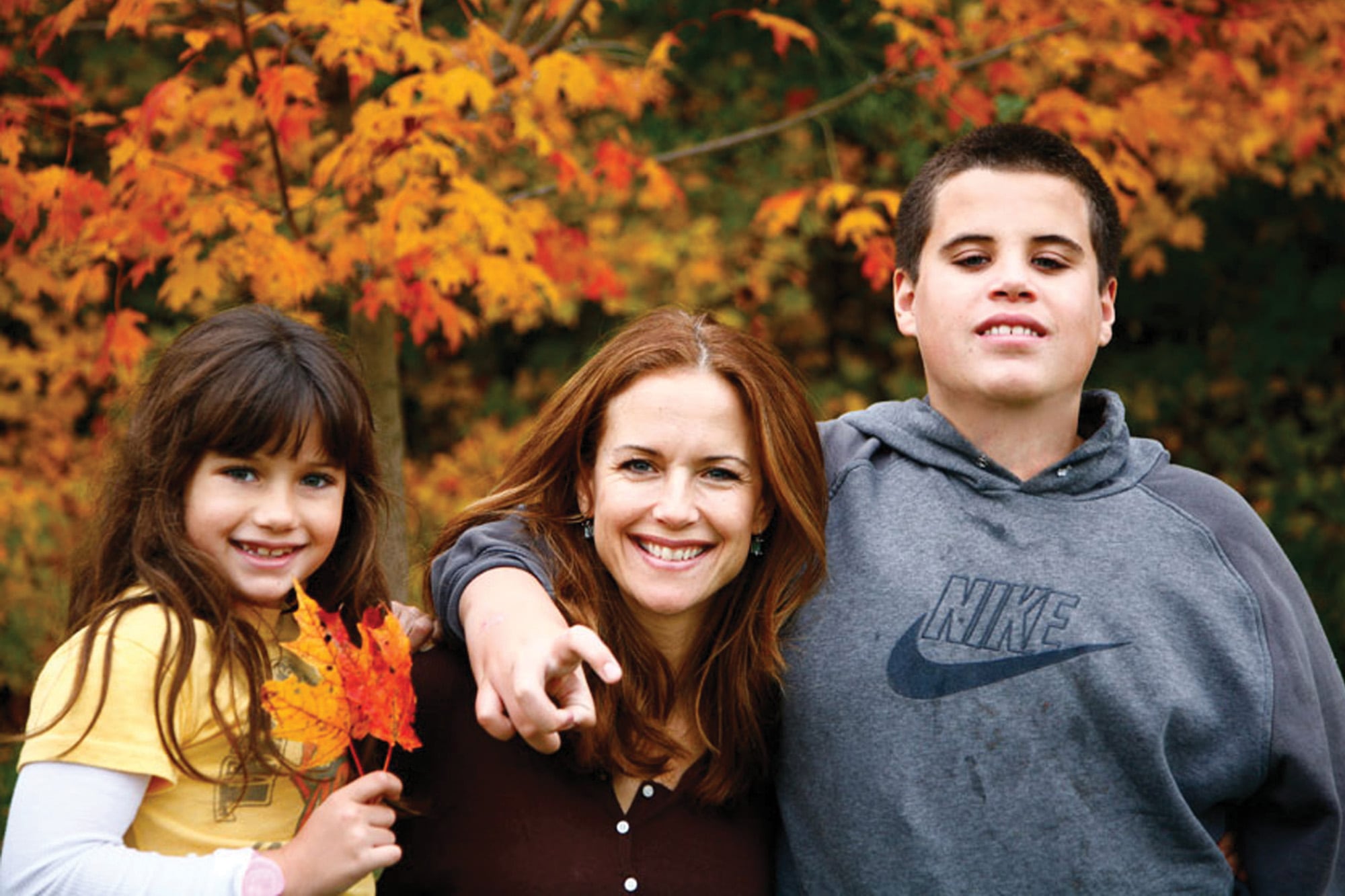 Junto a su
madre Kelly Preston
y su hermano Jett