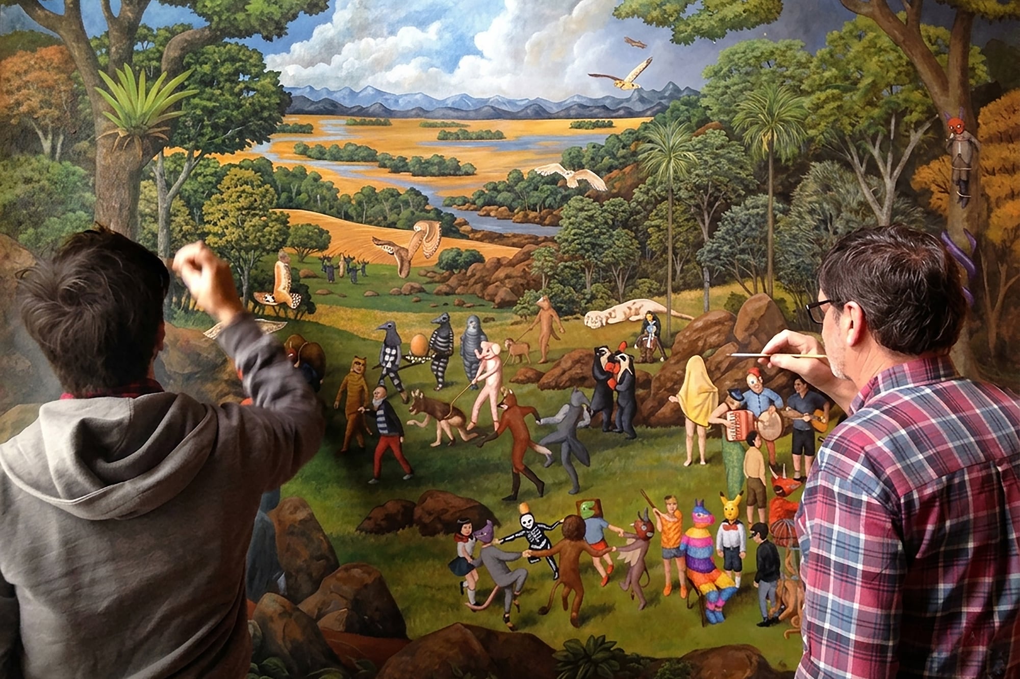 Marcelo padre e hijo pintando un carnaval fantástico