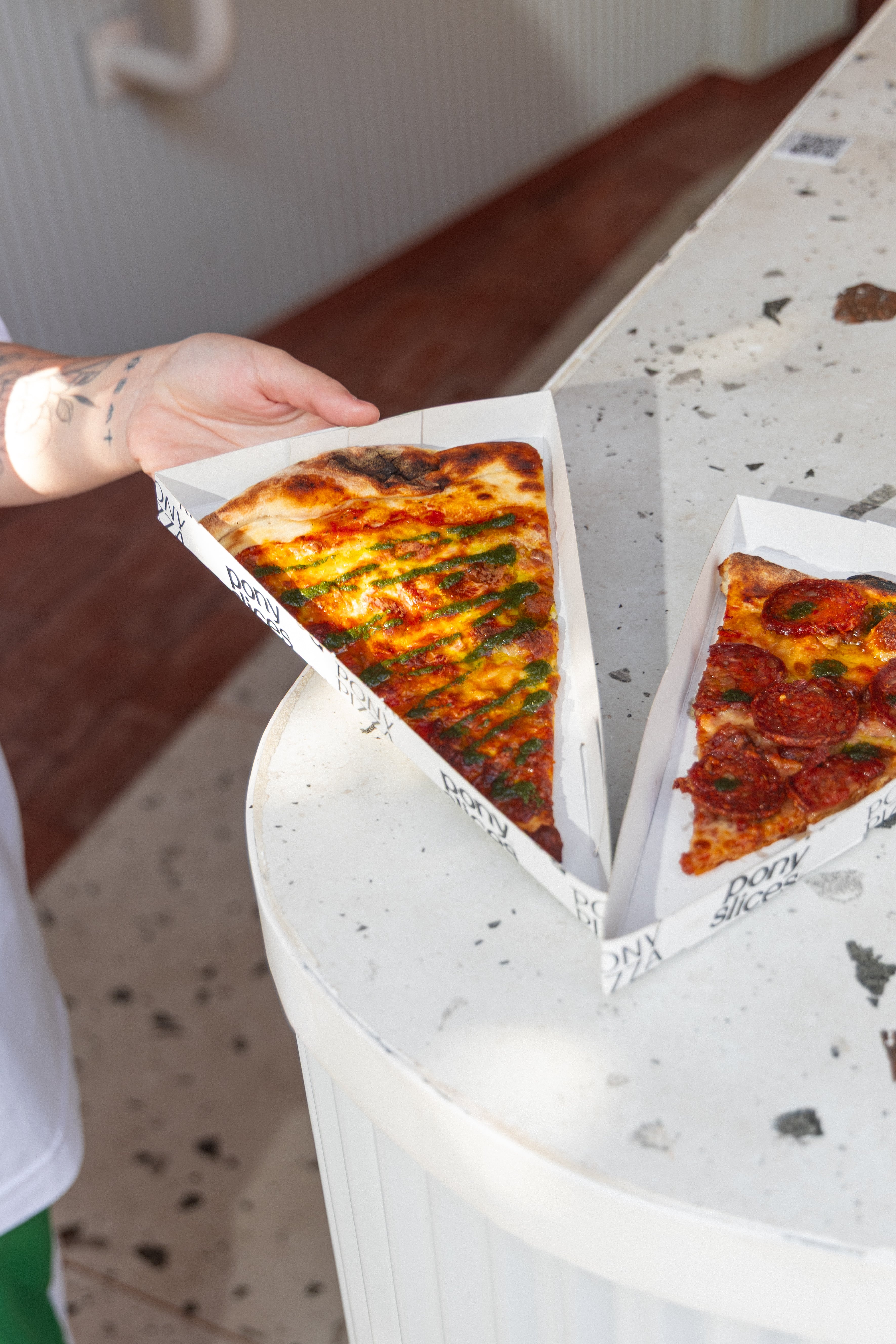 En Pony Pizza se estila comer por porciones