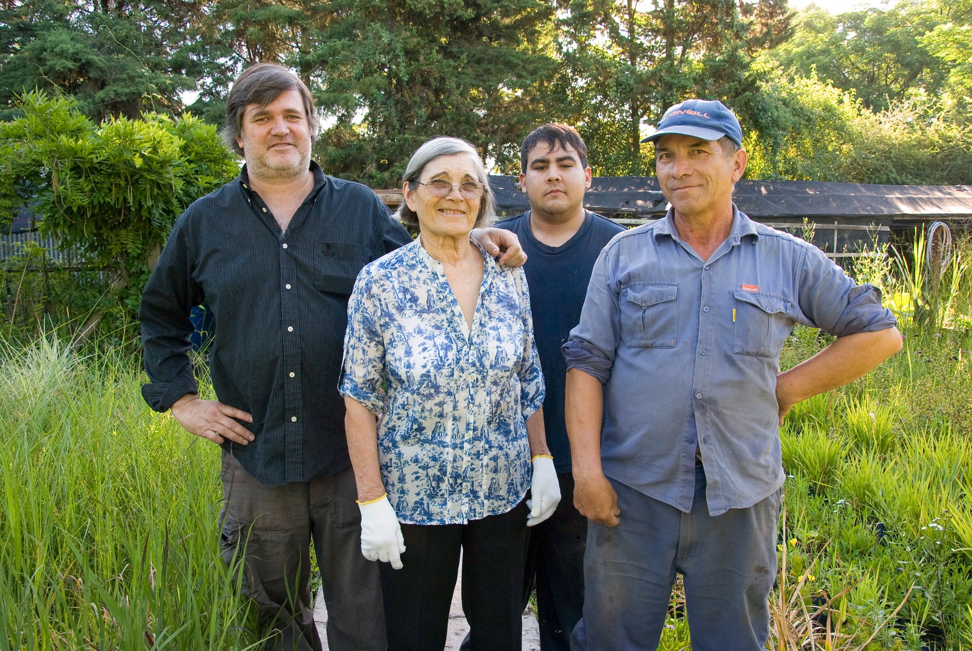 Junto a su hijo Enrique y sus colaboradores históricos