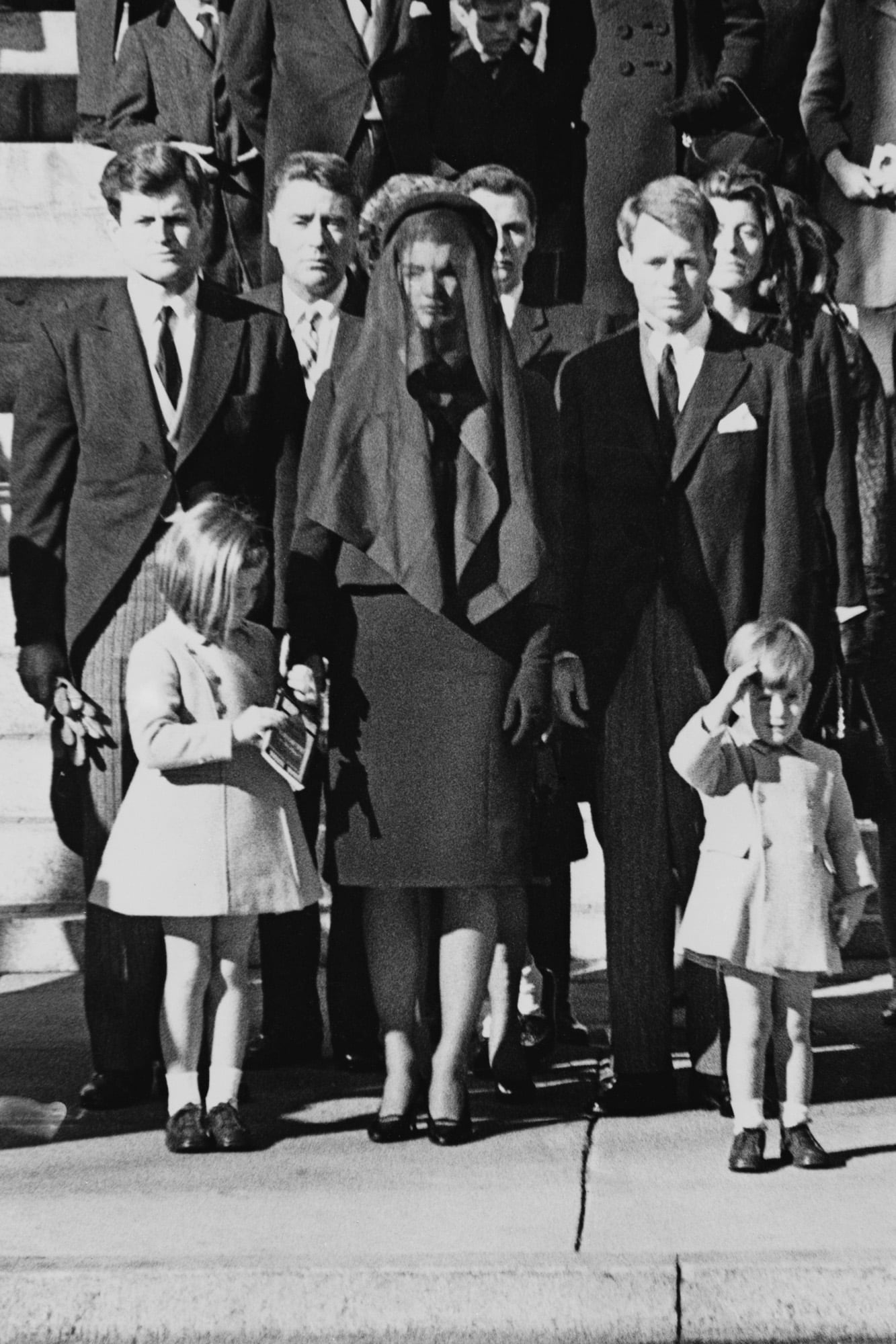 Members of the Kennedy family at the funeral of assassinated president John F. Kennedy at Washington DC. From left: Senator Edward Kennedy, Caroline Kennedy, (aged 6), Jackie Kennedy (1929 - 1994), Attorney General Robert Kennedy and John Kennedy (1960 - 1999) (aged 3). (Photo by Keystone/Getty Images)