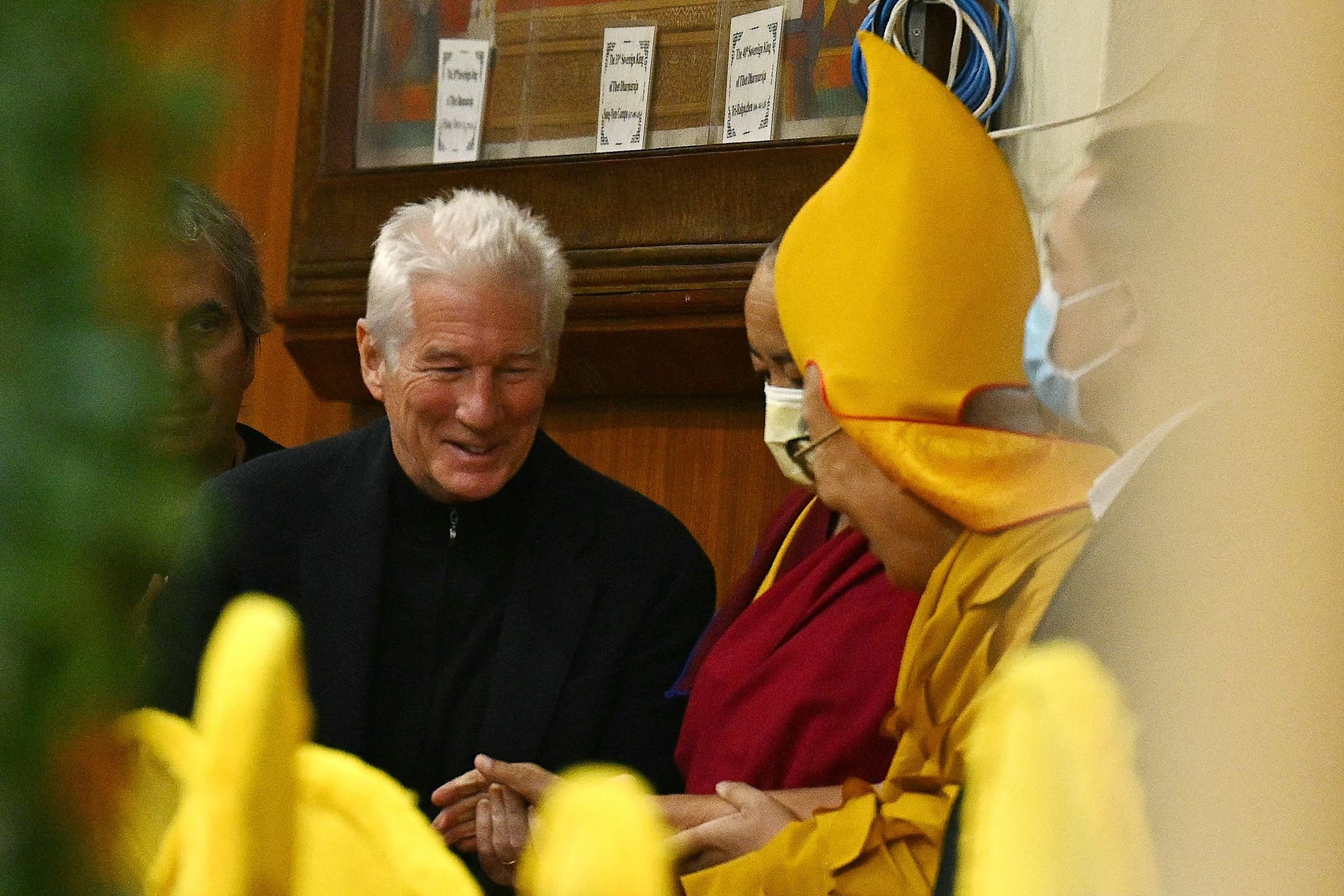 Richard Gere junto a Dalai Lama (Photo by Money SHARMA / AFP)