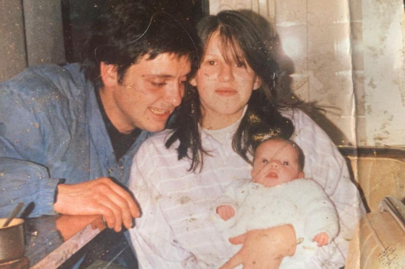 Eugenia, junto a sus padres.