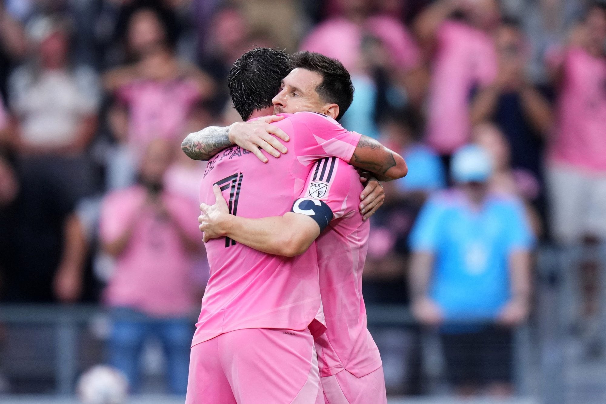 MIAMI, FLORIDA - MAY 17: Lionel Messi #10 of Inter Miami CF celebrates with teammate Rodrigo De Paul #7 after scoring his team's first goal during the MLS match between Inter Miami CF and Portland Timbers at Nu Stadium on May 17, 2026 in Miami, Florida. Rich Storry/Getty Images/AFP (Photo by Rich Storry / GETTY IMAGES NORTH AMERICA / Getty Images via AFP)